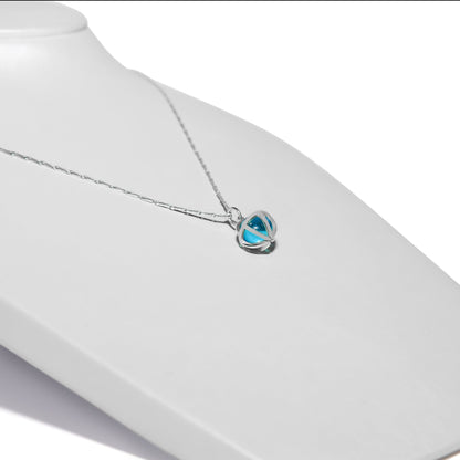 Side view of Drop of the Ocean Necklace - Fairtrade 9 Carat White Gold & Swiss Blue Topaz Sphere Necklace by Booblinka Jewellery