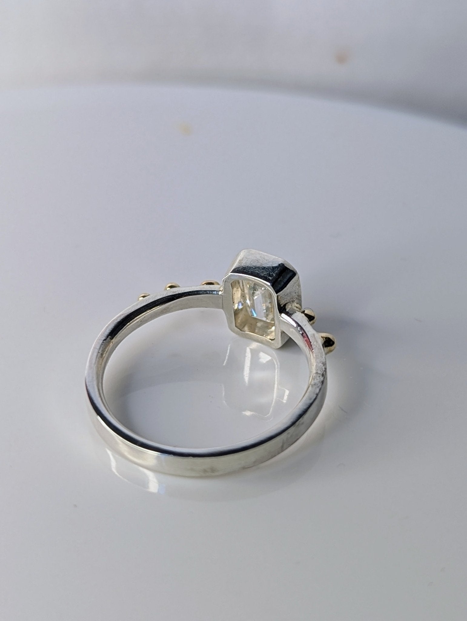 Back detail of Emerald-Cut Moissanite and Gold Accent Ring – DEI Collection by Booblinka Jewellery