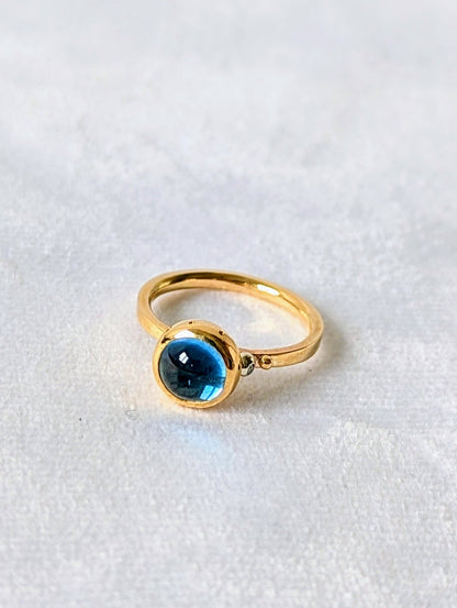 Swiss Blue Topaz Cabochon Gold Ring – Drop of the Ocean CollectionRingsBooblinka Jewellery