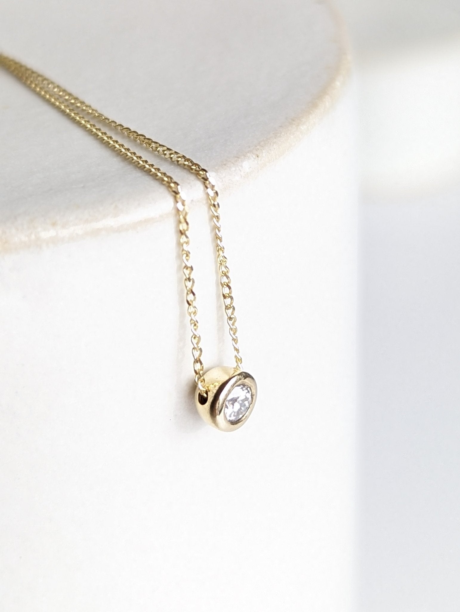 Delicate gold DEI necklace with moissanite - Booblinka Jewellery