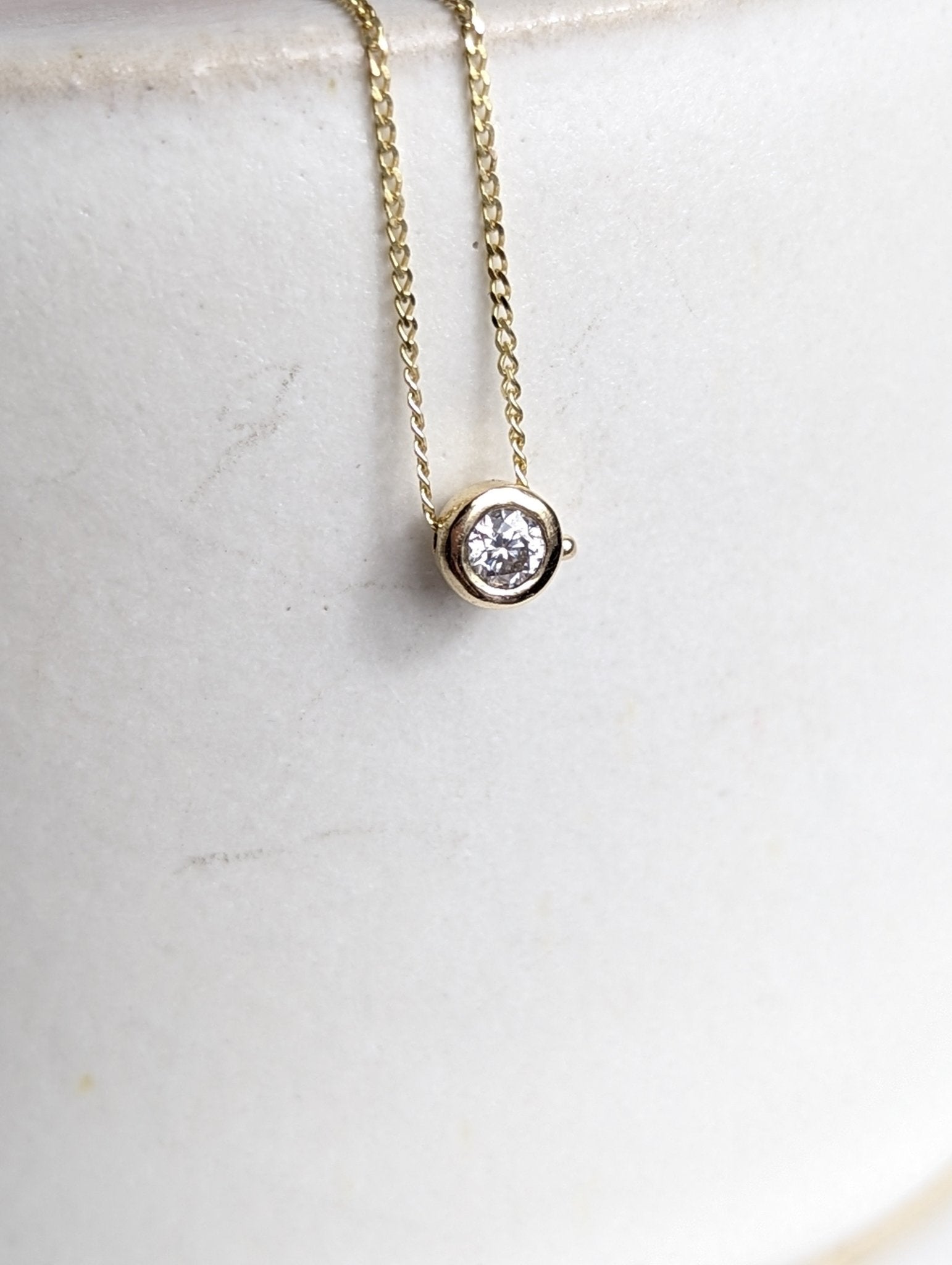 Minimalist gold DEI necklace with sparkly moissanite - Booblinka Jewellery