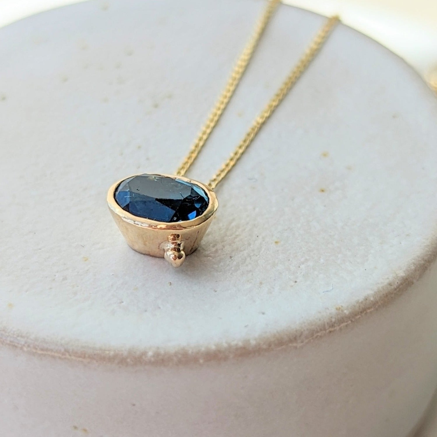 Detail of Oval London Blue Topaz Necklace in 9 Carat Gold from Ocean Collection made by Booblinka Jewellery